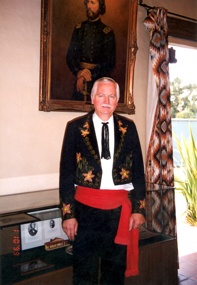 Jim Gulbranson curator of Campo dressed as a Don for the event